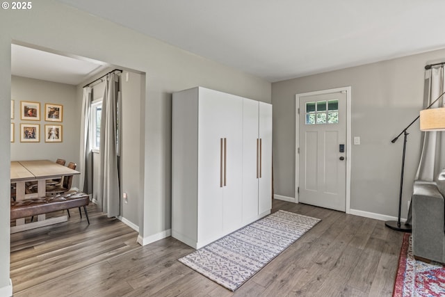 entrance foyer with hardwood / wood-style floors