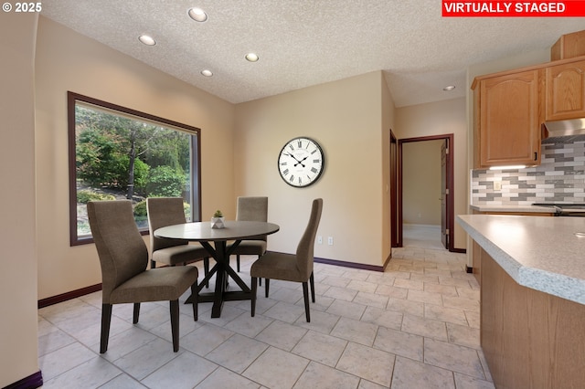 16402 SE Teal Ct, Damascus, OR 97089 - dining room with recessed lighting, baseboards, and a textured ceiling