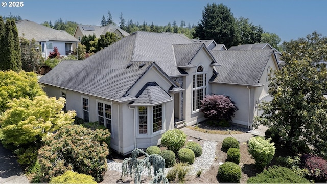 16402 SE Teal Ct, Damascus, OR 97089 - rear view of property with stucco siding and a shingled roof