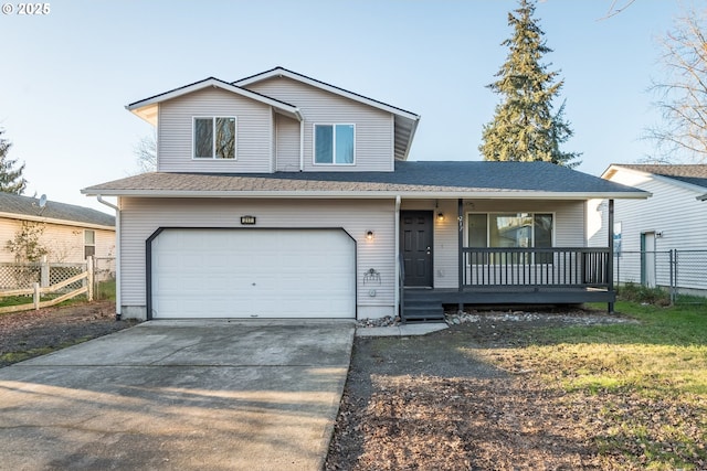 view of front of property featuring a garage, a porch, and a front lawn