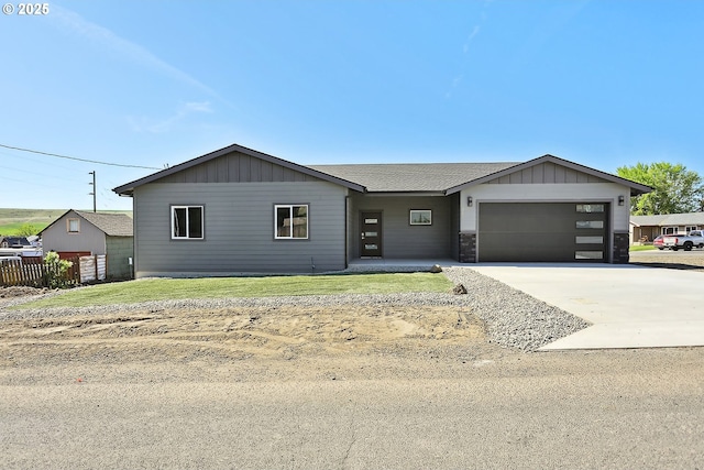 365 NW 4th St, Dufur, OR 97021 - view of front of property featuring driveway and an attached garage