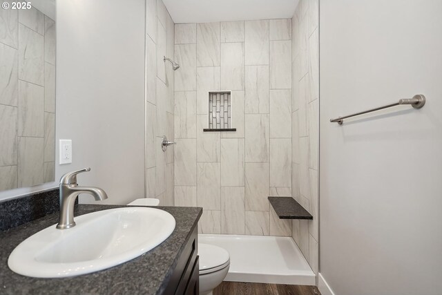 365 NW 4th St, Dufur, OR 97021 - full bathroom featuring toilet, tiled shower, and vanity