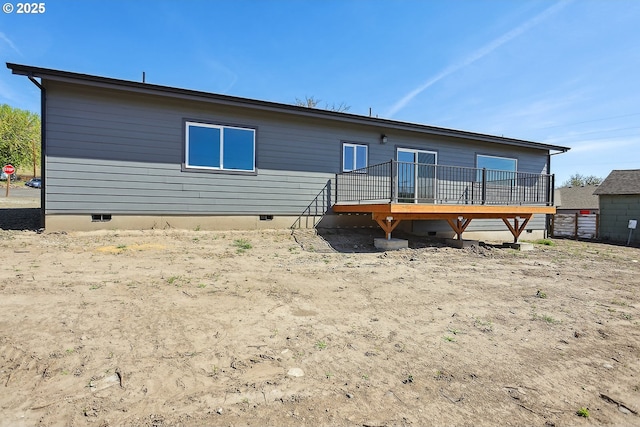 365 NW 4th St, Dufur, OR 97021 - back of property with crawl space and a deck