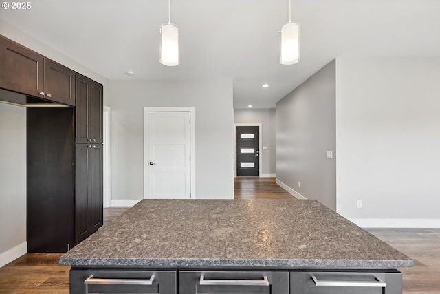 365 NW 4th St, Dufur, OR 97021 - kitchen featuring dark wood-style floors, dark brown cabinetry, baseboards, a center island, and recessed lighting