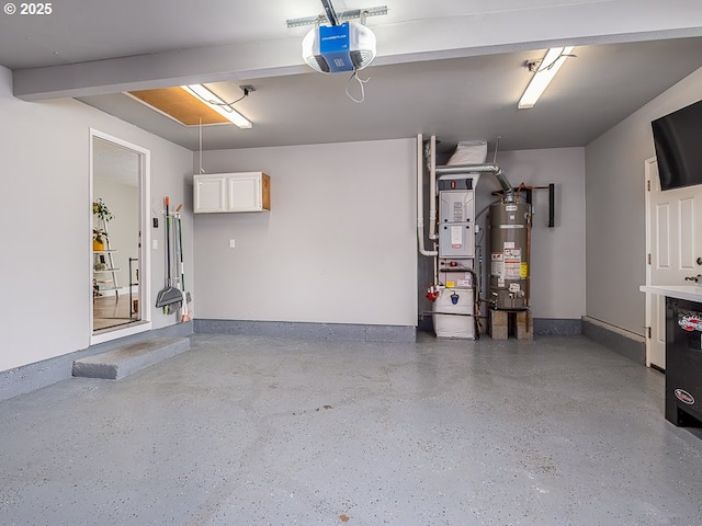 garage featuring water heater, heating unit, a garage door opener, and baseboards
