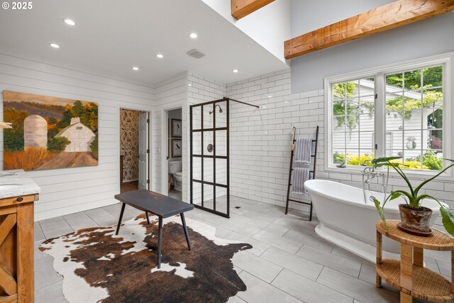 21424 SW 65th Ave, Tualatin, OR 97062 - bathroom with a shower stall, a freestanding bath, toilet, recessed lighting, and tile walls