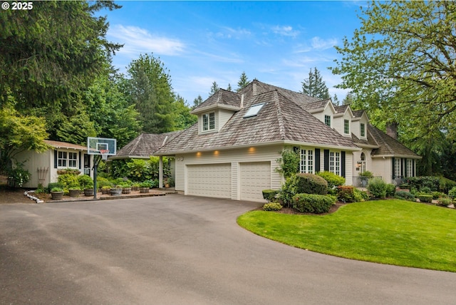 21424 SW 65th Ave, Tualatin, OR 97062 - view of front facade with asphalt driveway, a front lawn, and an attached garage