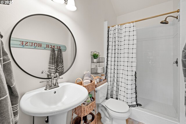 21424 SW 65th Ave, Tualatin, OR 97062 - bathroom featuring a sink, a shower stall, and toilet