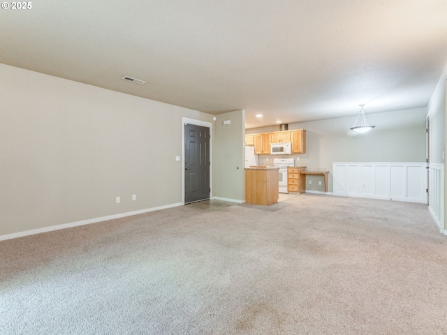14019 NE 20th Ave Unit D32, Vancouver, WA 98686 - unfurnished living room with light colored carpet
