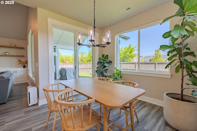 10107 NE 136th Ave, Vancouver, WA 98682 - dining space featuring baseboards, a chandelier, and dark wood finished floors