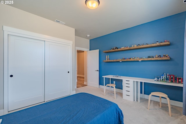 10107 NE 136th Ave, Vancouver, WA 98682 - bedroom with carpet floors, a closet, baseboards, and a desk