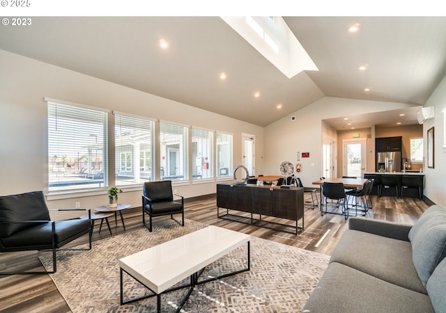 10107 NE 136th Ave, Vancouver, WA 98682 - living area with plenty of natural light, lofted ceiling, wood finished floors, recessed lighting, and a skylight