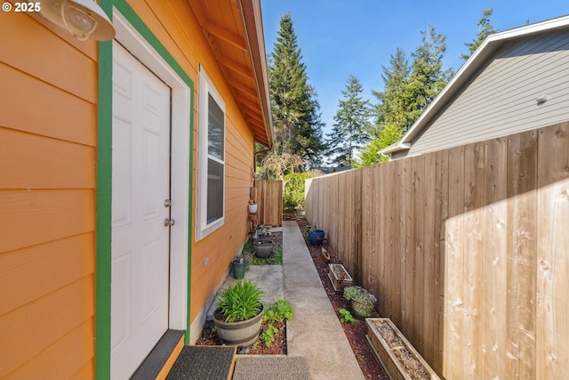 view of property exterior featuring fence