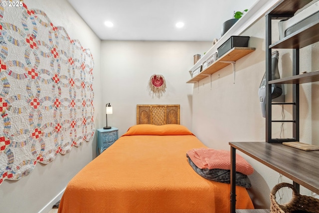 bedroom featuring recessed lighting