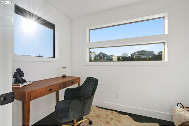 office area featuring baseboards