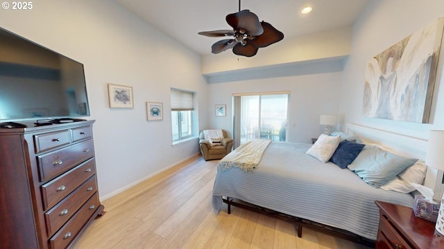 bedroom featuring light wood-type flooring and ceiling fan