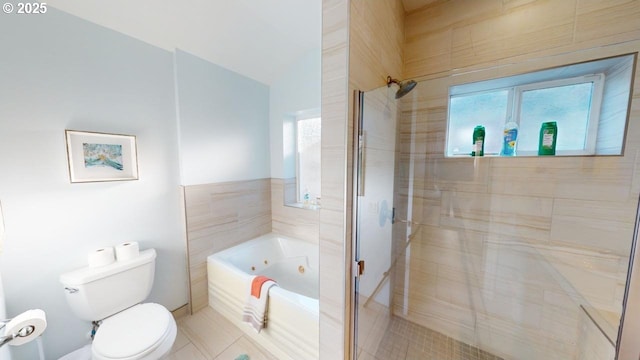 bathroom with separate shower and tub, tile patterned floors, and toilet