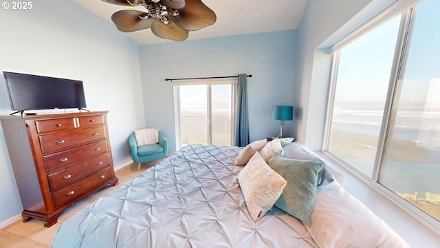 bedroom featuring multiple windows, light wood-type flooring, and ceiling fan