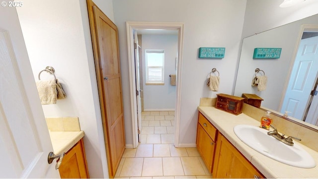 bathroom featuring tile patterned floors and vanity