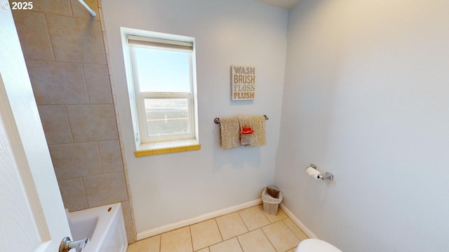 bathroom with tile patterned flooring and toilet