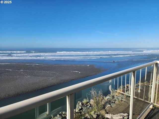 property view of water featuring a beach view