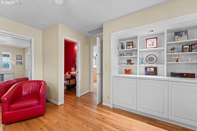 21047 NE Interlachen Ln, Fairview, OR 97024 - living area featuring light wood-type flooring and a textured ceiling