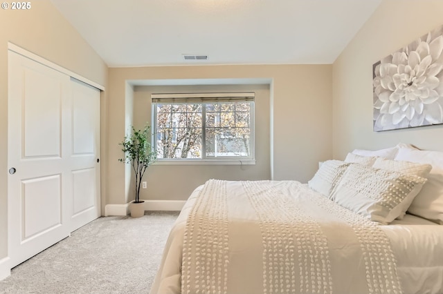 18445 SW Stepping Stone Dr Unit 16, Beaverton, OR 97003 - carpeted bedroom with lofted ceiling, baseboards, and a closet