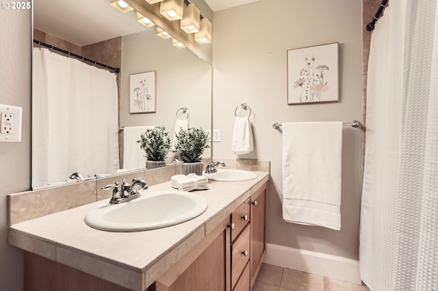 18445 SW Stepping Stone Dr Unit 16, Beaverton, OR 97003 - full bath featuring double vanity, tile patterned flooring, baseboards, and a shower with shower curtain