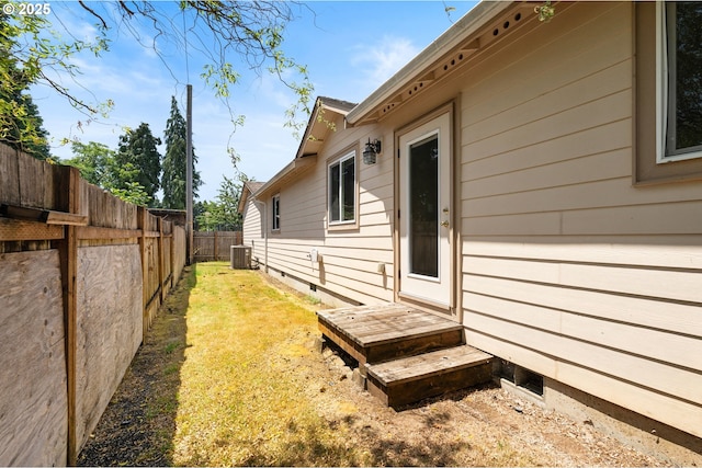 1264 Ostrander Ln, Cottage Grove, OR 97424 - view of side of home featuring a fenced backyard and a central AC unit