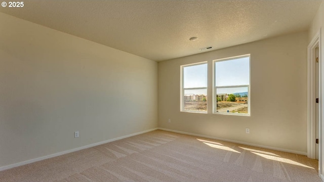 2873 V St, Springfield, OR 97477 - spare room with light colored carpet and a textured ceiling