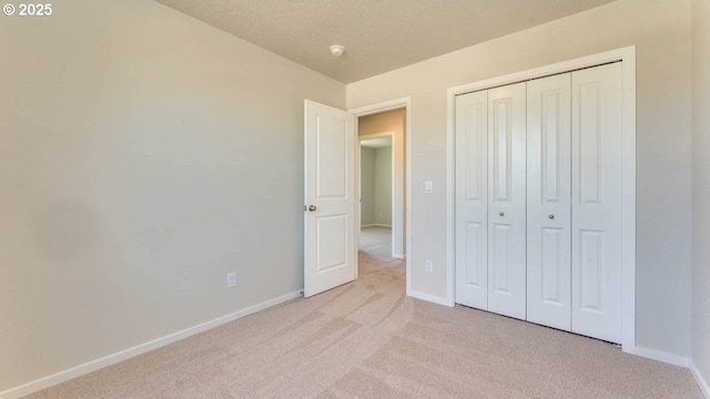 2873 V St, Springfield, OR 97477 - unfurnished bedroom with light carpet and a closet