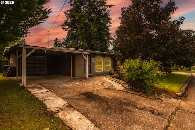 742 Shangri La Ave, Salem, OR 97303 - view of front of house with driveway, a front lawn, and an attached carport