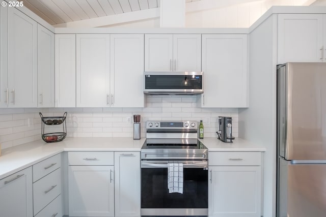 742 Shangri La Ave, Salem, OR 97303 - kitchen with appliances with stainless steel finishes, backsplash, and light countertops