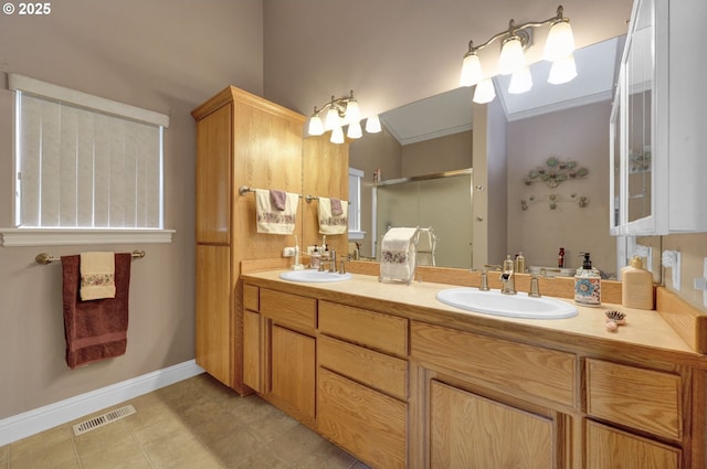 1565 Fairview Pl, Cottage Grove, OR 97424 - bathroom featuring double vanity, a shower stall, lofted ceiling, tile patterned floors, and baseboards