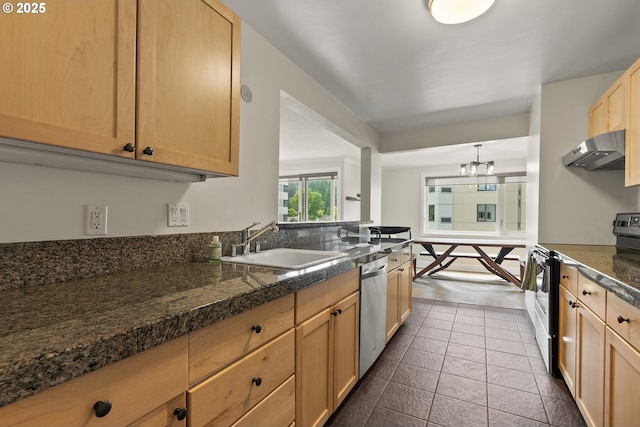 2211 SW Park Pl, Portland, OR 97205 - kitchen with appliances with stainless steel finishes, ventilation hood, light brown cabinets, a chandelier, and tile counters