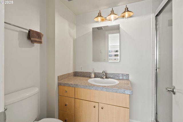 2211 SW Park Pl, Portland, OR 97205 - bathroom featuring vanity and a shower with shower door