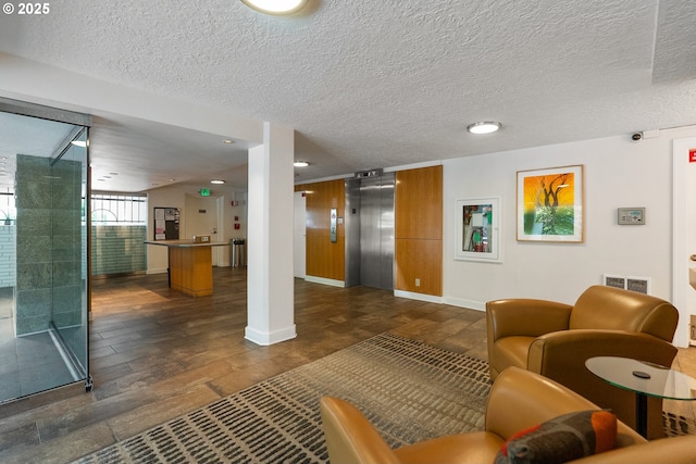 2211 SW Park Pl, Portland, OR 97205 - community lobby featuring a textured ceiling and a security system