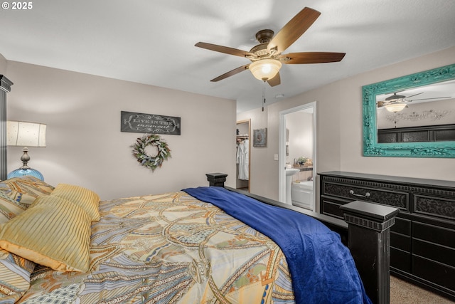 bedroom with ensuite bathroom, ceiling fan, and a closet