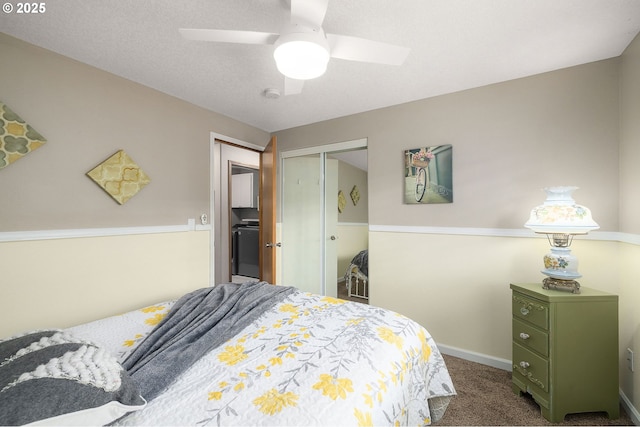 carpeted bedroom with a textured ceiling, ceiling fan, and a closet