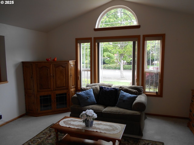 4471 Spring Meadow Ave, Eugene, OR 97404 - living room with light colored carpet, vaulted ceiling, and baseboards