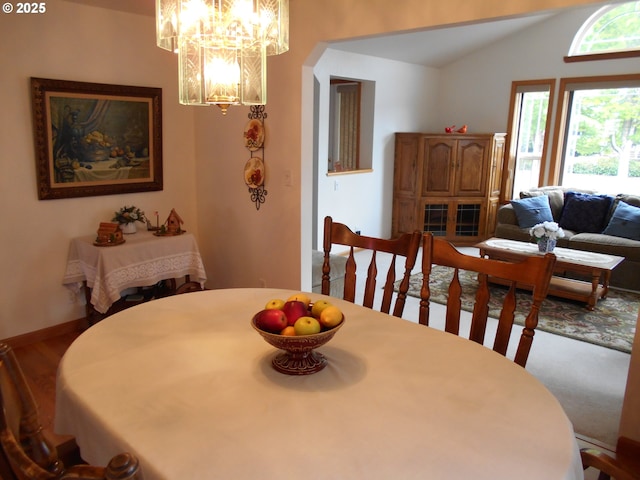 4471 Spring Meadow Ave, Eugene, OR 97404 - dining area with a chandelier and vaulted ceiling