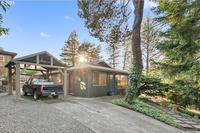 view of side of home featuring a carport