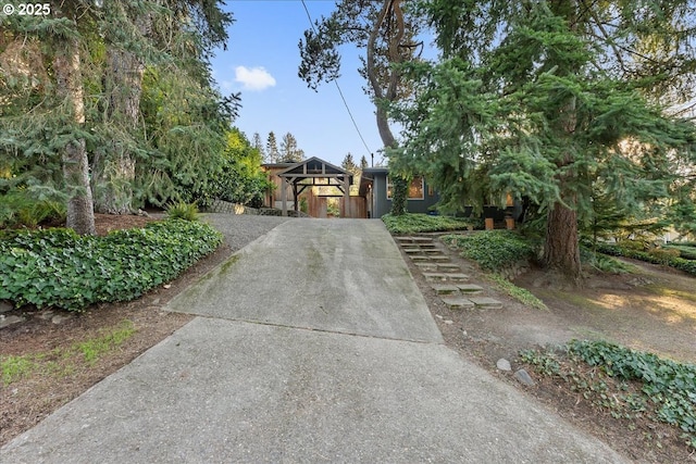 view of property hidden behind natural elements