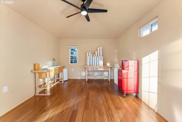 miscellaneous room with wood-type flooring and ceiling fan