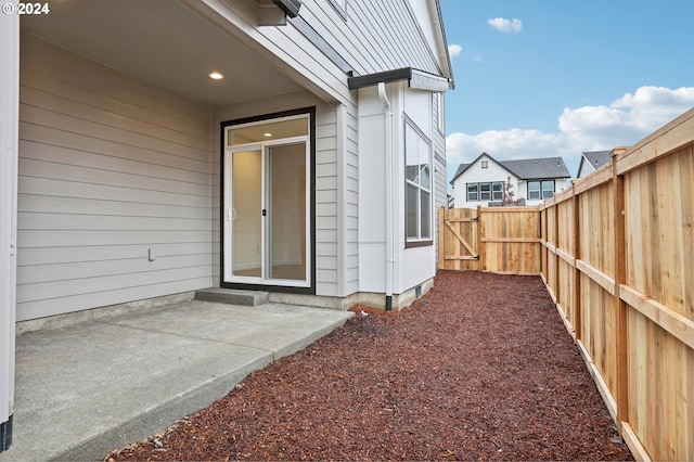view of yard featuring a patio area and a fenced backyard
