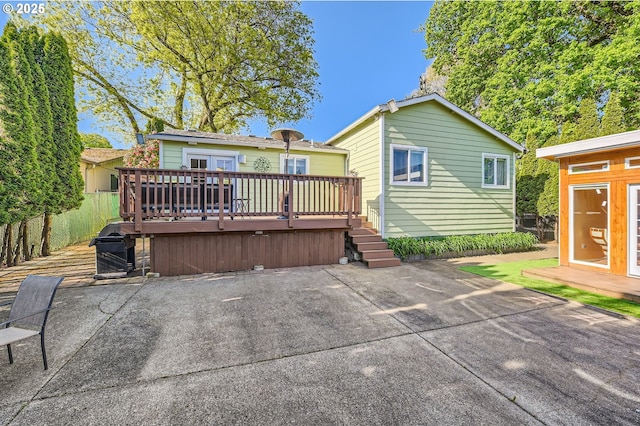 2433 NE Saratoga St, Portland, OR 97211 - rear view of property featuring a patio and a deck