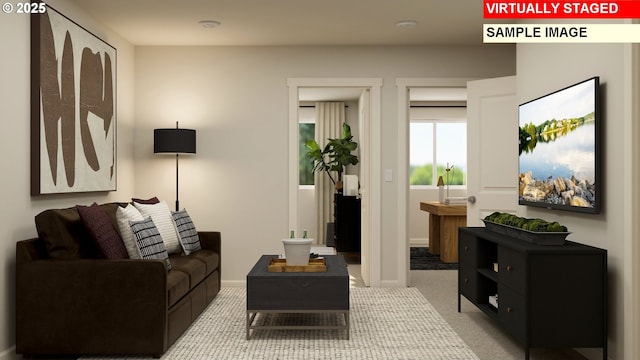 856 Eaden St, Woodburn, OR 97071 - living room featuring baseboards and carpet floors