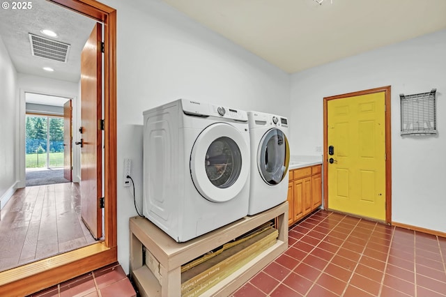 39225 SW Oak Ln, Willamina, OR 97396 - laundry room featuring washer and dryer, cabinet space, baseboards, and recessed lighting