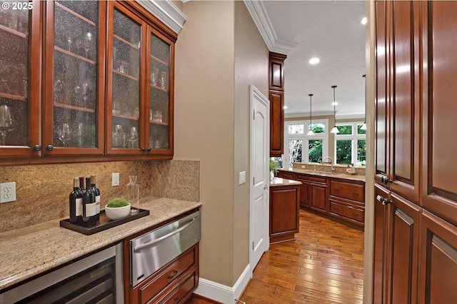 bar with tasteful backsplash, a sink, dark wood-style floors, a warming drawer, and recessed lighting