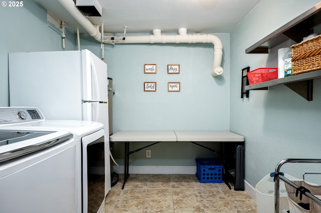 washroom featuring washer and dryer